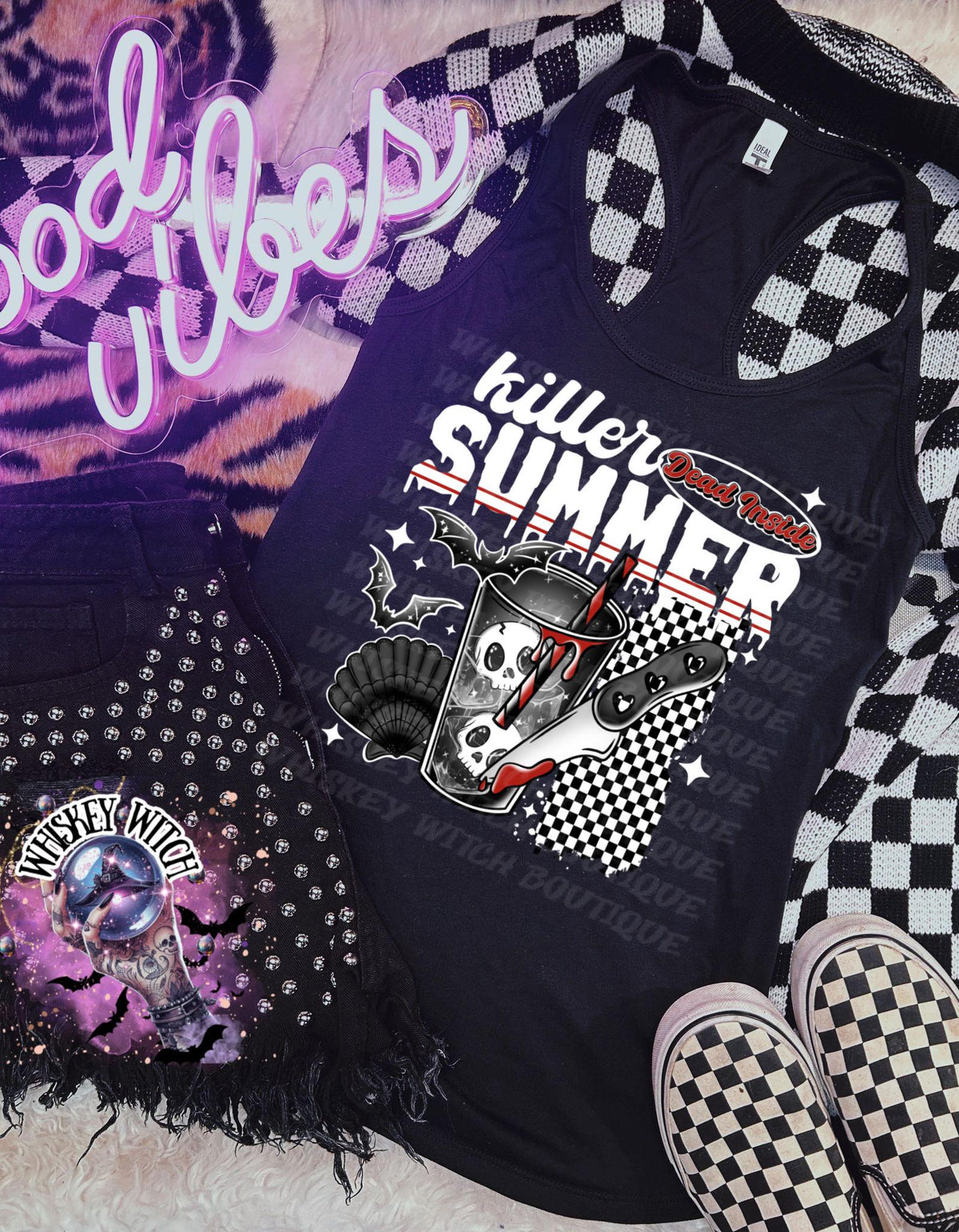 Spooky summer tank top on a mannequin with a goth skull drink design, bats, red accents, and bold white lettering.