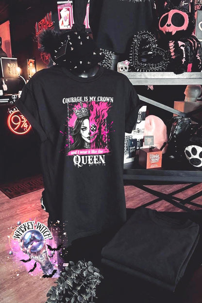 Lifestyle flat lay of gothic quote shirt styled with checkerboard shoes, bracelet, and pink aesthetic background for an edgy outfit vibe.