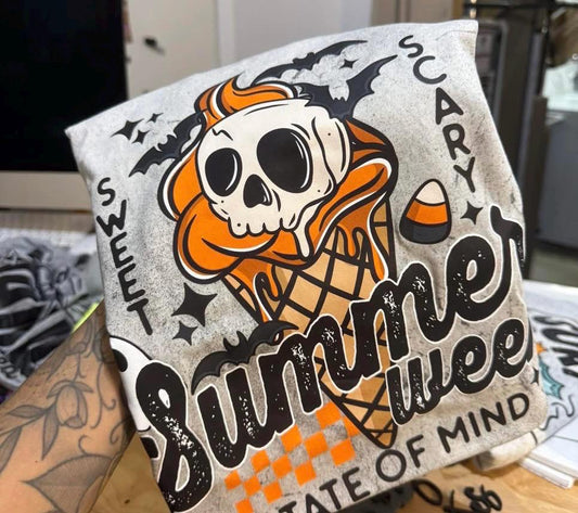 Handmade goth summer vacation tee featuring ghost, ice cream cone, and Halloween-inspired details.
Gray Summerween graphic T-shirt styled for a beach day with spooky cute design.