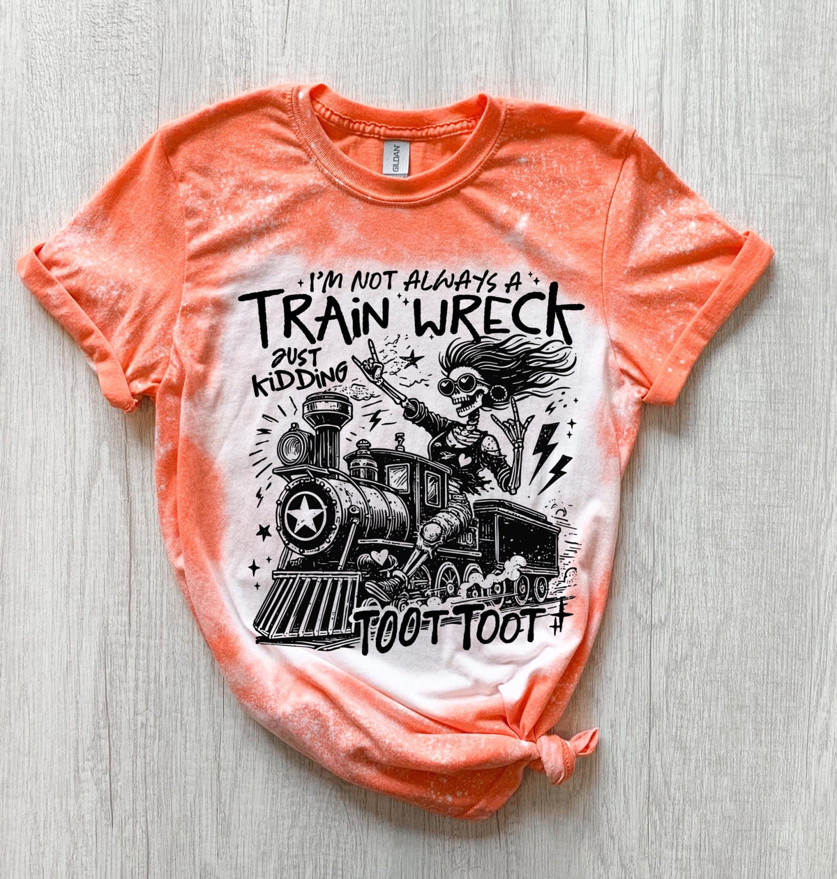Bleached handmade graphic T-shirt with funny train wreck skeleton design and black text that says I’m not always a train wreck just kidding toot toot.