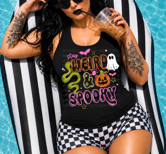 Handmade Black spooky tank top with bright Stay Weird & Spooky ghost, pumpkin, snake, and bat design styled by the pool.